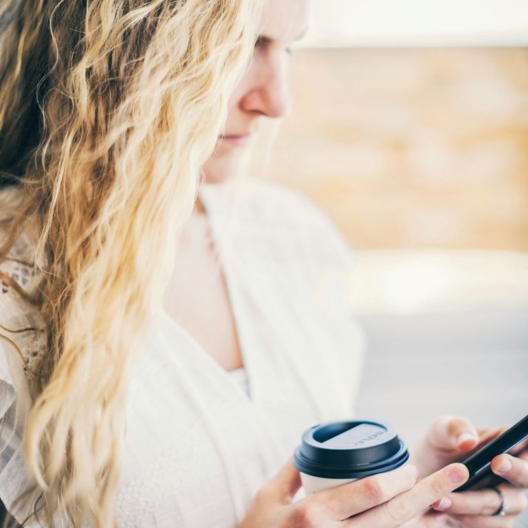 woman phone coffee